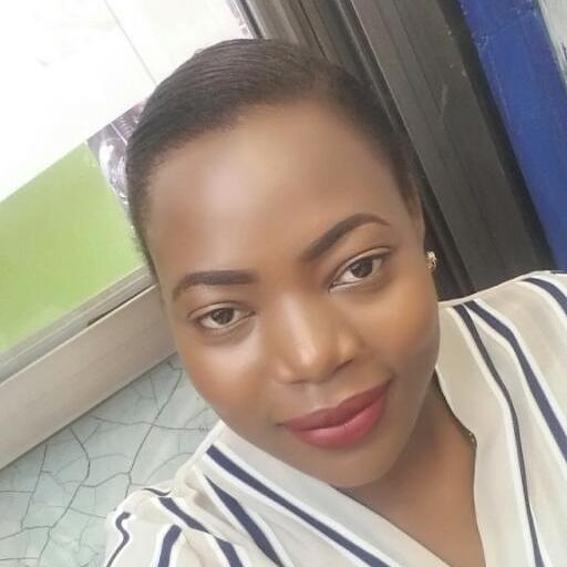 CAROLINE  NAKAWOOYA
